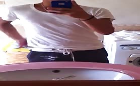 Selfie boy undressing himself and showing his boner