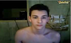A gay teen sloppy cums to cell phone porn