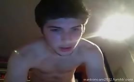 Horny gay teen sporty boy has fun jerking his cock and watching porn.mp4-muxed