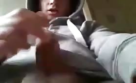 Straight boy jerking off his big uncut cock and cumming on his jacket