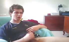 Young gay German boy jerks his teen cock while watching porn