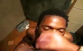 Black dude sucking dick in public bathroom