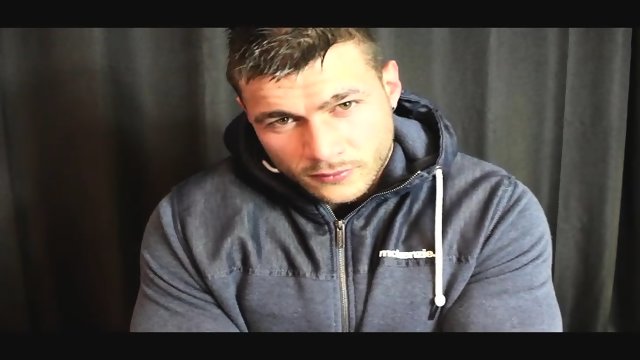 Flexing his muscle and jerk