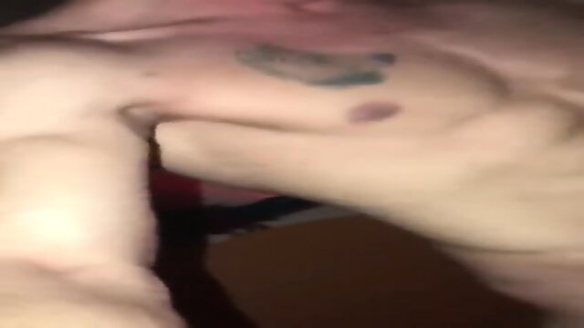 Tattoed guys having sex in a hotel room